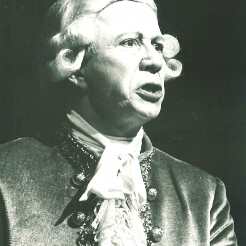 Porträtt av en man med kravatt och peruk