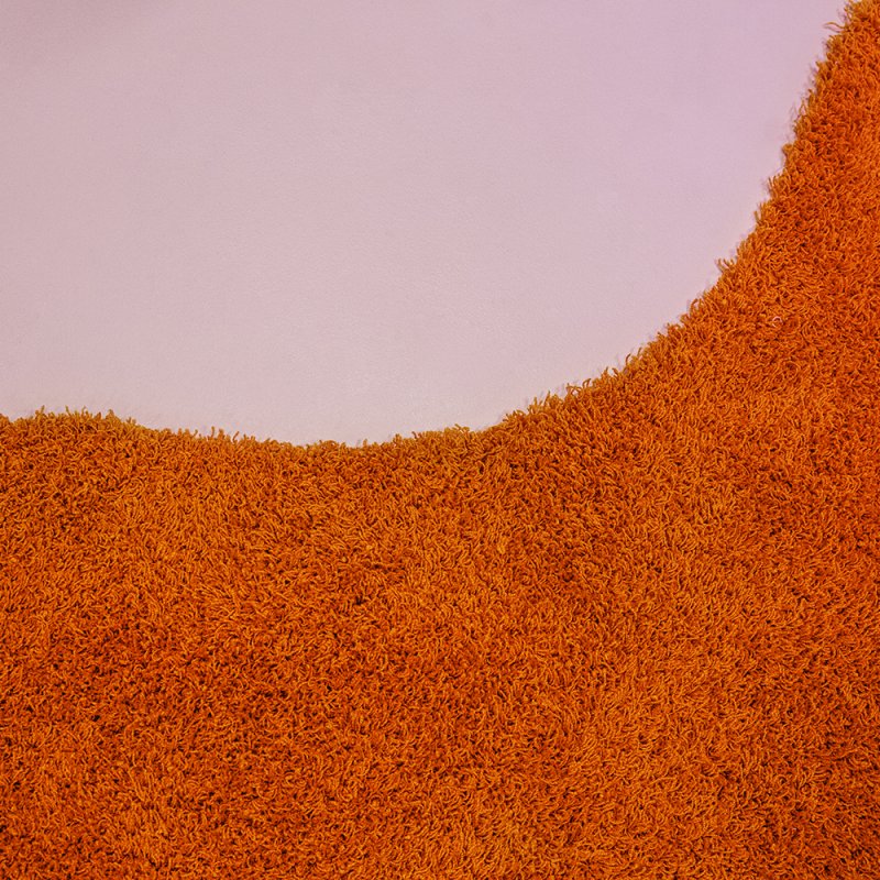 Formen av en orange matta.