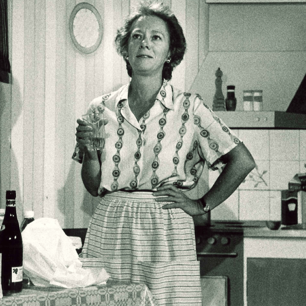 Kvinna i kök